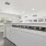 a kitchen with white cabinets