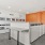 a large kitchen with white appliances
